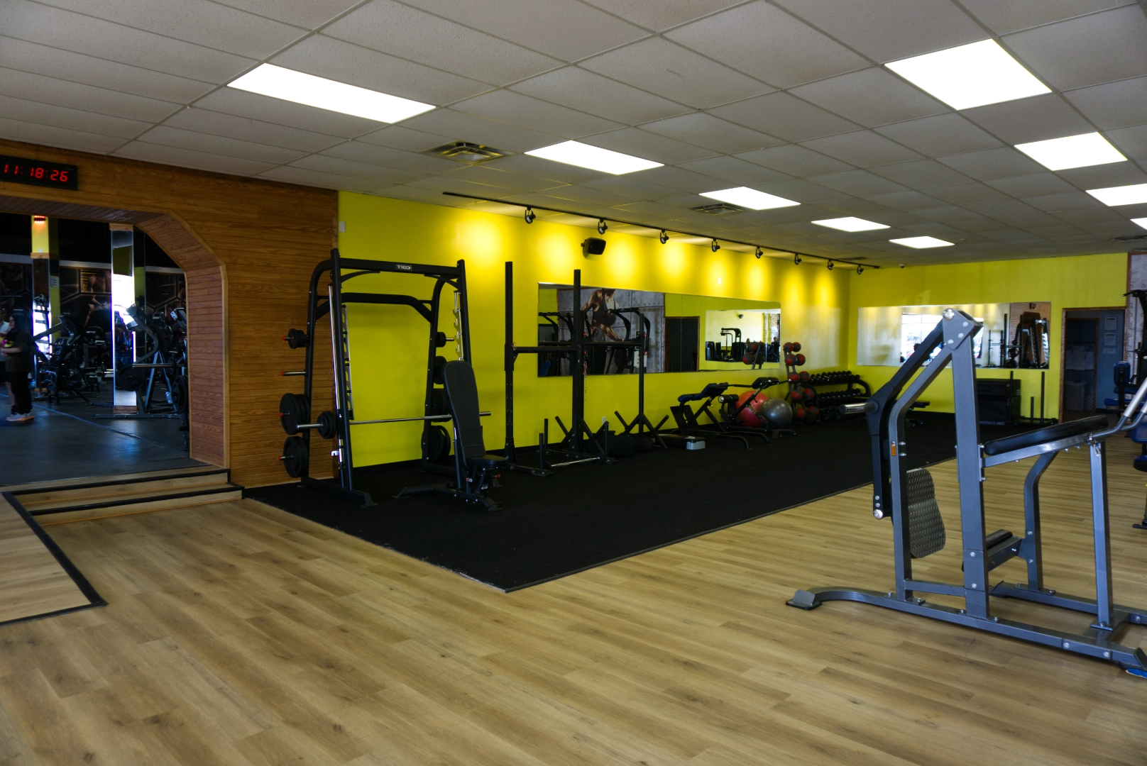 Padded and carpeted floor exercise area.