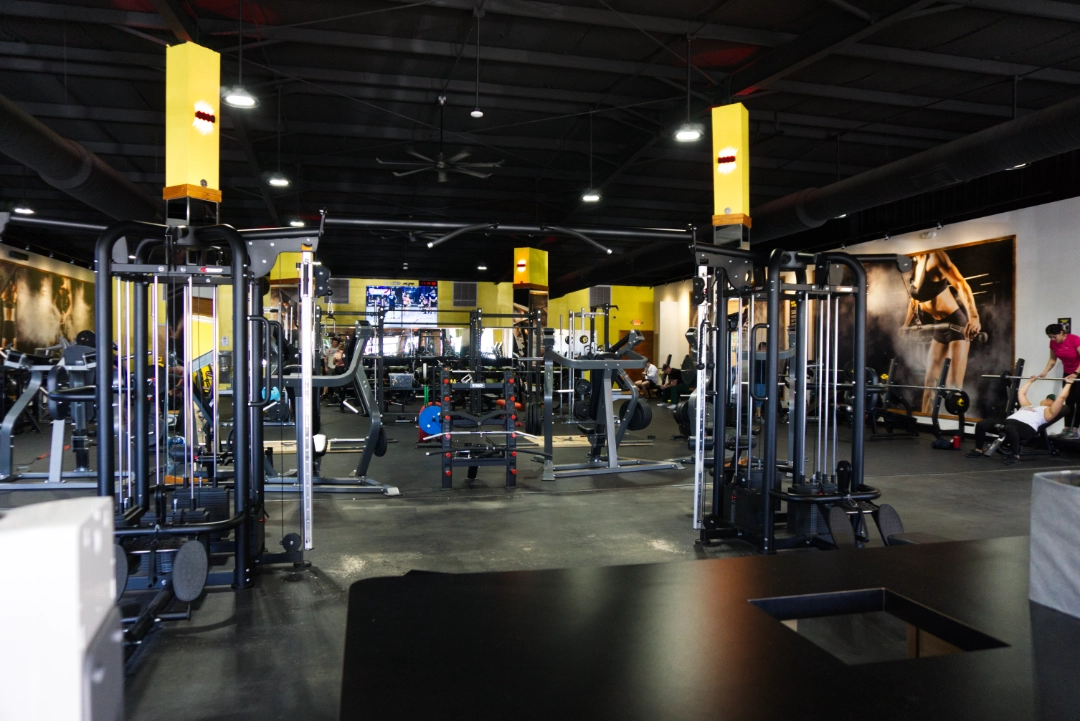 Main weight room located at 24 Seven Club Fitness